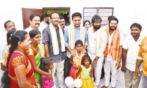 Beneficiaries receive 560 2BHK houses from KTR