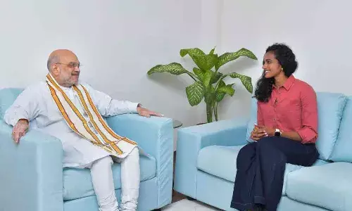 Meeting between PV Sindhu and Amit Shah