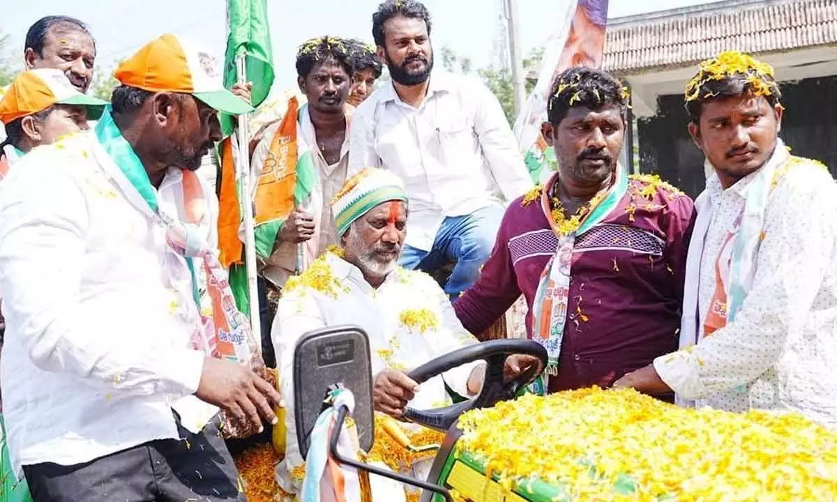 Bhatti accelerates in a tractor in Khammam