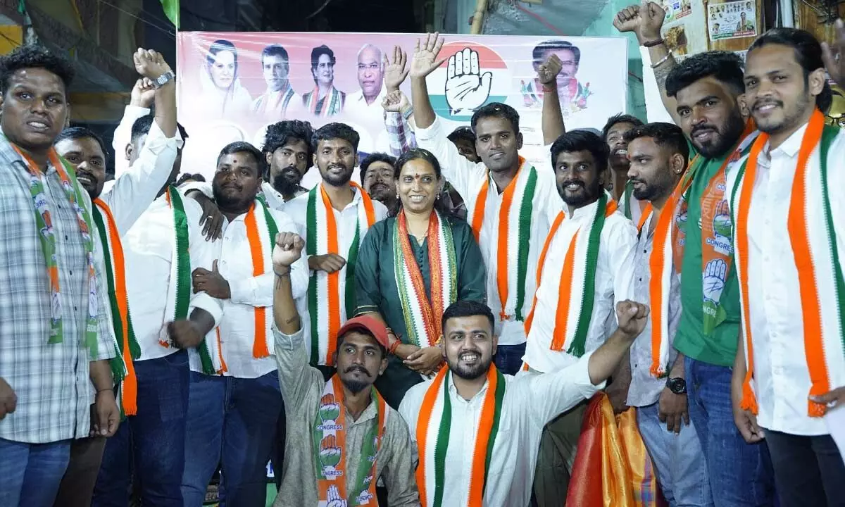 Vijaya Reddy, Congress candidate from Khairatabad, campaigns in Himayatnagar division.