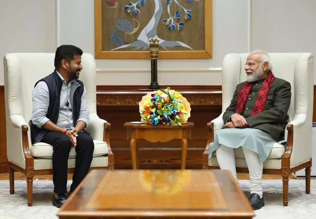 PM in New Delhi meets Revanth and Bhatti