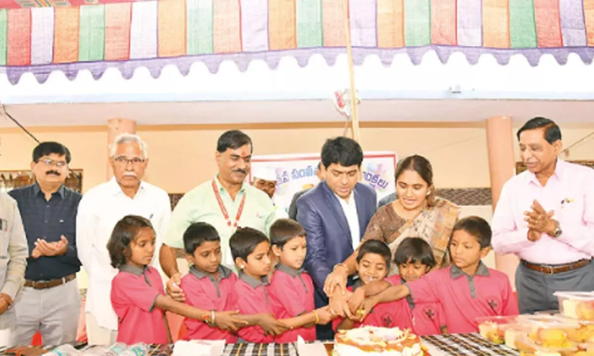 Collector celebrates New Year at orphanages in Mahabubnagar