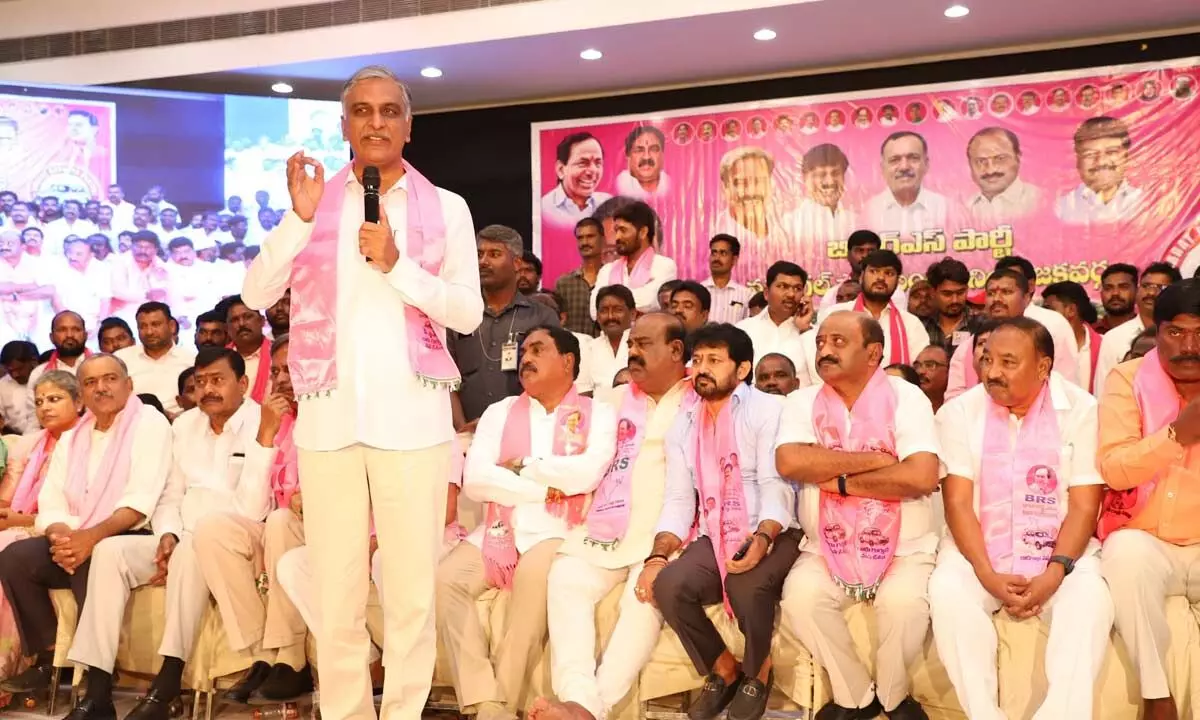 Harish leads BRS members in a rally