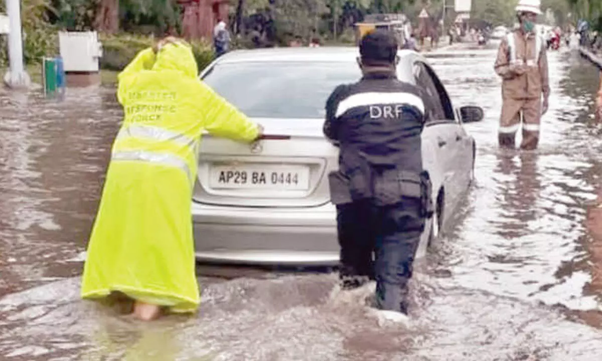 State experiences relief from heat as heavy rains pour.