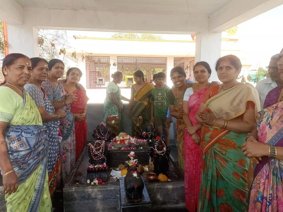 Devotees participate in Rudrabhishekam worship