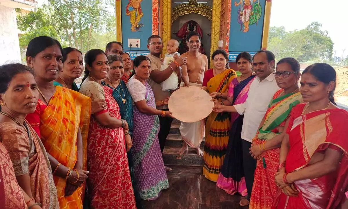 "Offering of a Kilogram Silver Wheel to Santoshimatha Goddess"