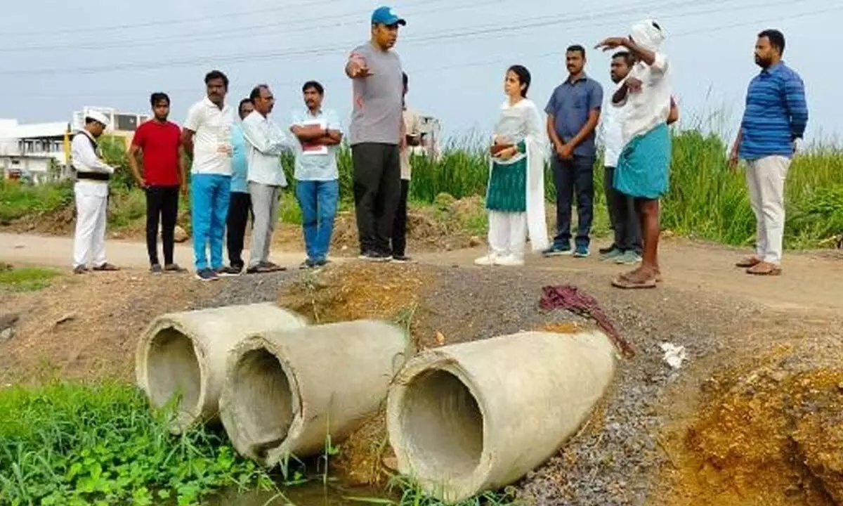 Collector conducts inspections in flood-prone areas