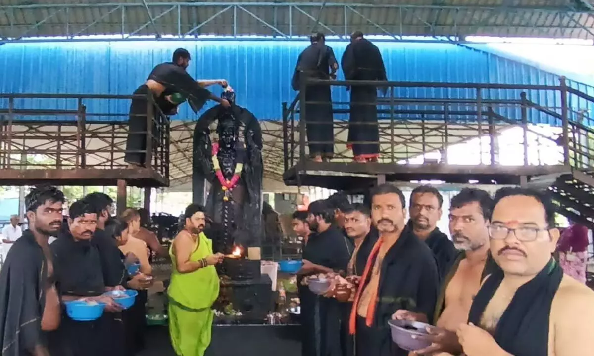 Devotees Devoutly Conduct Tila Oil Abhisheka Pujas for Shani Dev