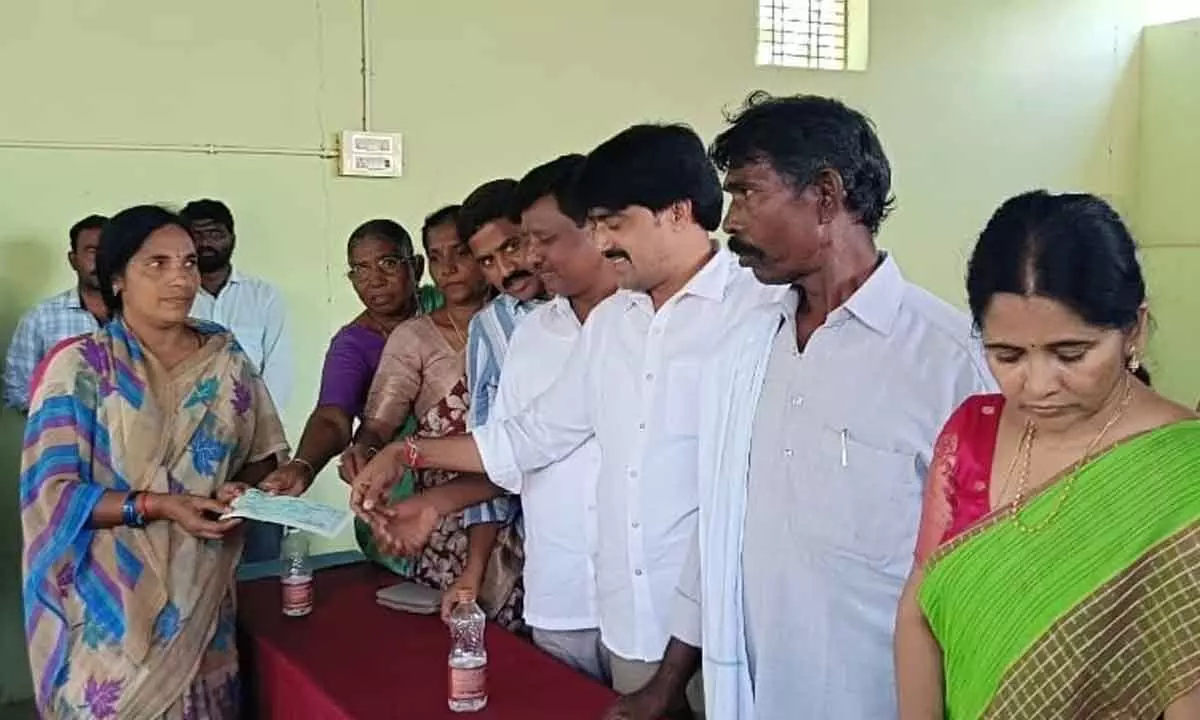 Alampur MLA Vijayudu Hands Out Kalyana Lakshmi and Shaadi Mubarak Cheques at Aiza Tahsildar Office.