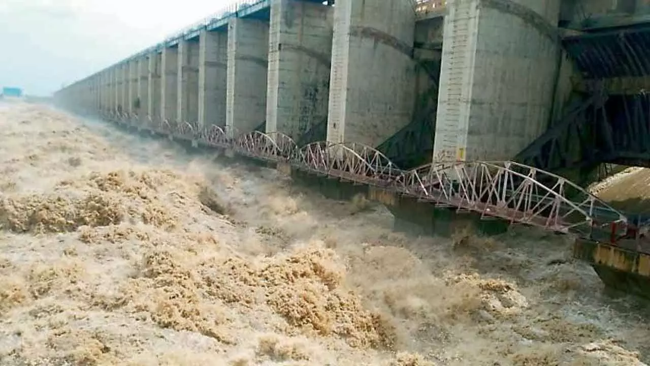 "Srisailam Reservoir Sees Heavy Inflow, Radial Crest Gates Raised Once More"