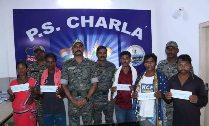 District SP Rohith Raju Presents Reward Cheques to Surrendered Maoists