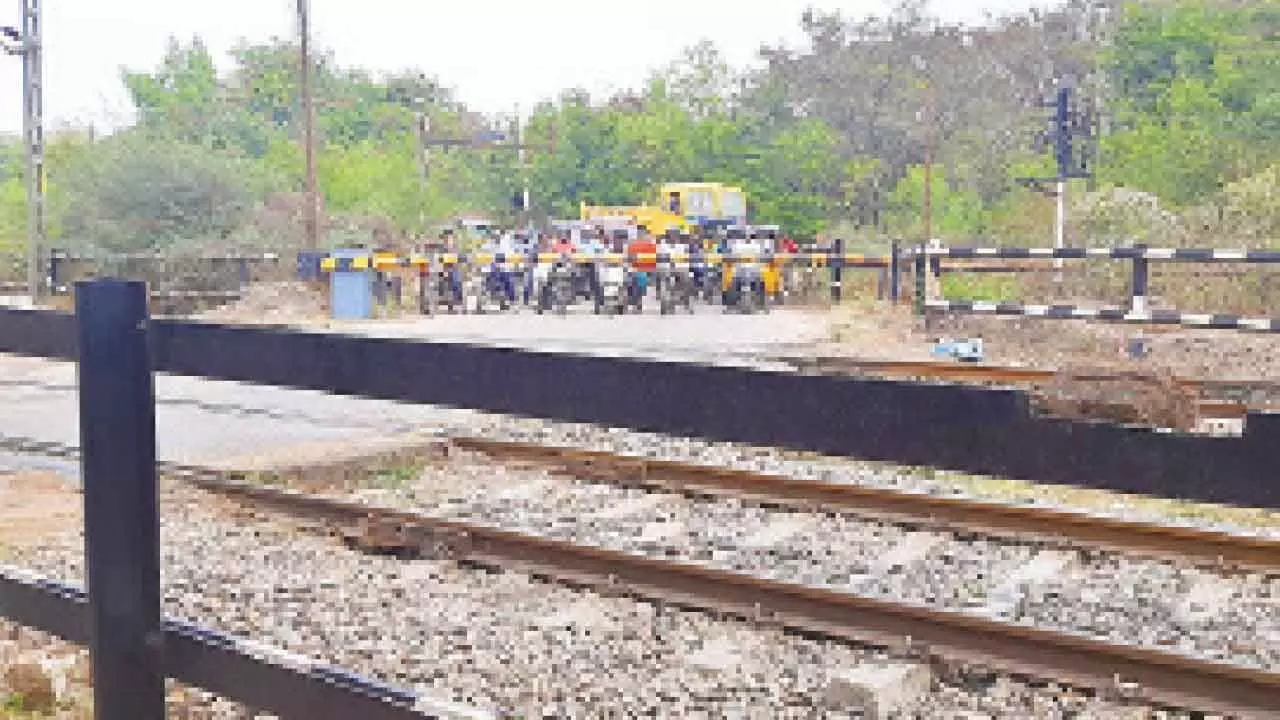 Residents protest over the lack of RUB/ROB in Malkajgiri