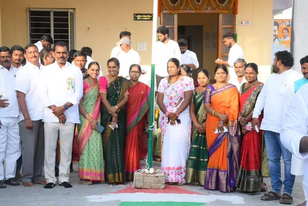 MLA Megha Reddy raises the flag at the camp office