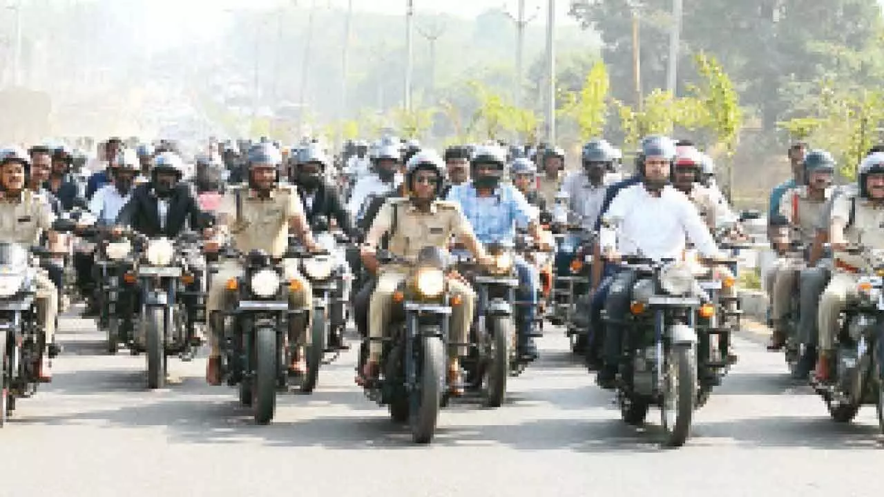 Bhupalapally: Bikers encouraged to wear helmets to stay safe in road accidents