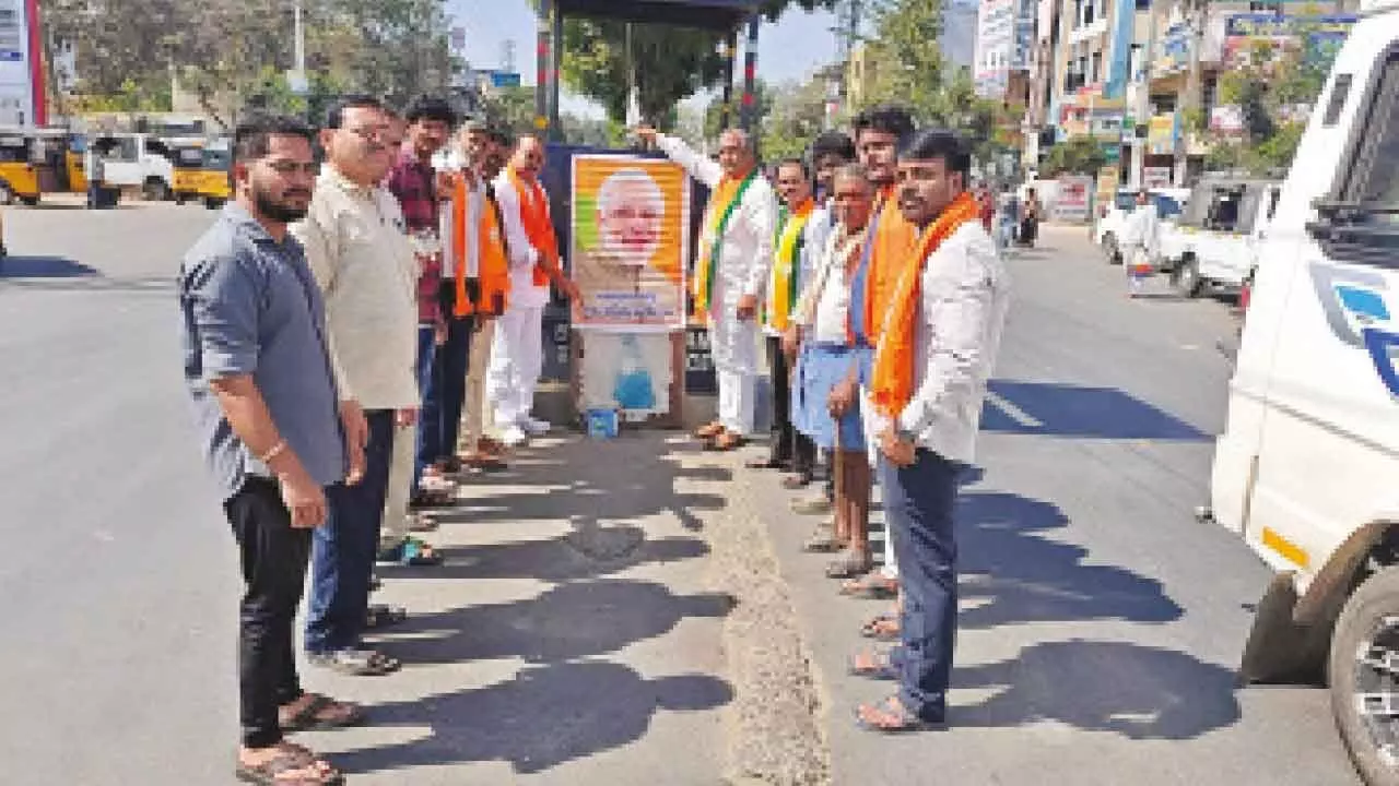 BJP leaders pour sacred water on Prime Minister Narendra Modi's portrait