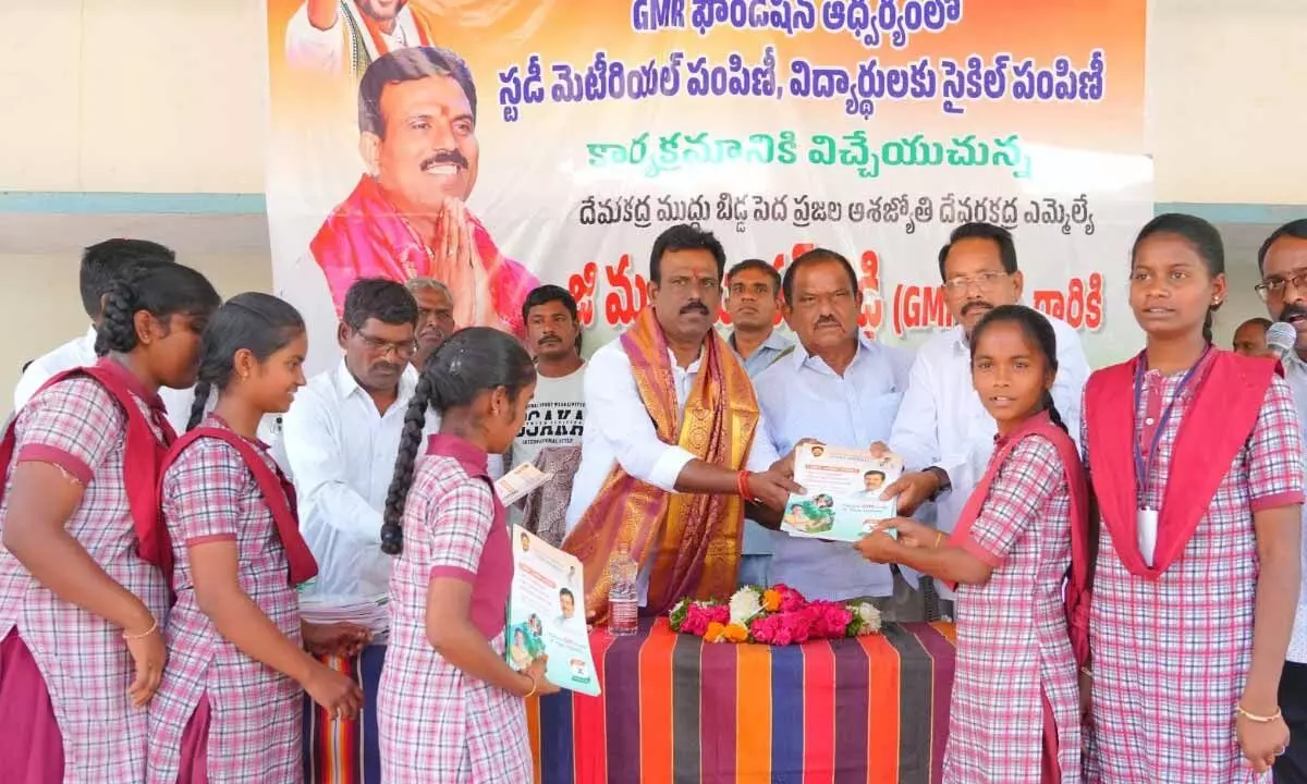 MLA G. Madhusudhan Reddy Hands Out Study Materials and Bicycles to Students